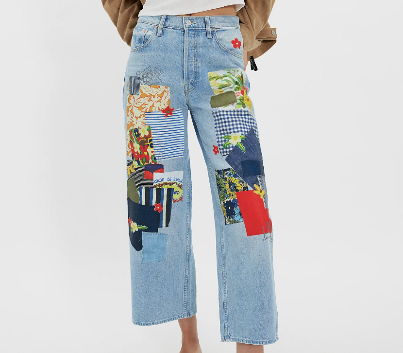 MOTHER The High-Waisted Spinner Flood Printed Jeans in light wash denim with mixed floral and graphic patchwork panels